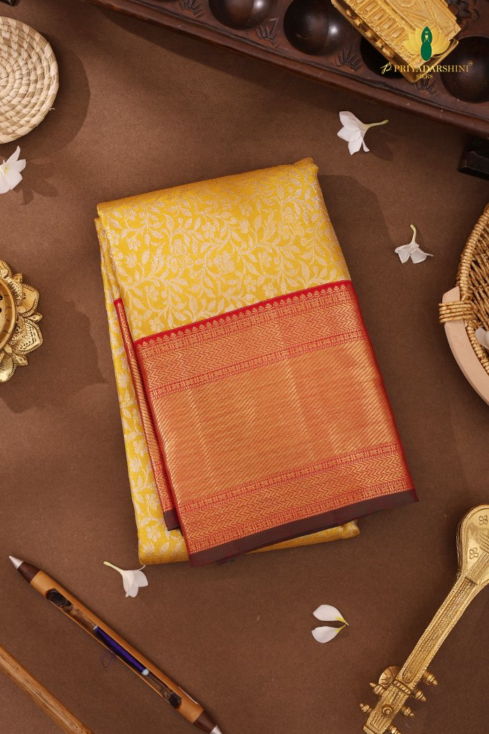 Kanchipuram Silk In Gold And Yellow With Korvai Border