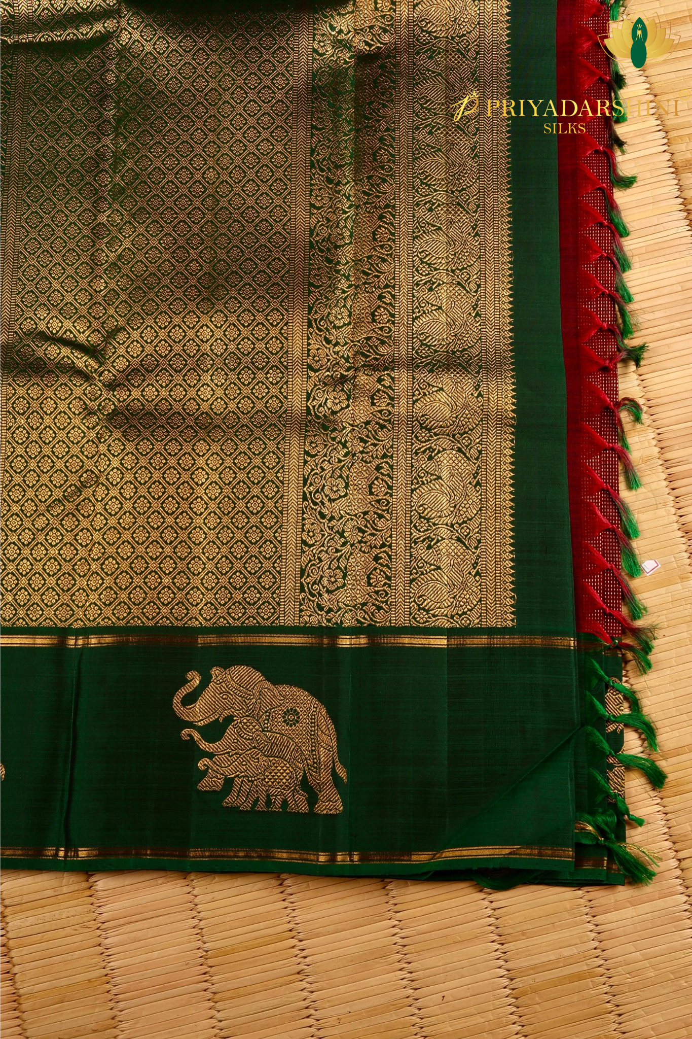 Kanchipuram Silk In Maroon With Elephant Zari Work Border