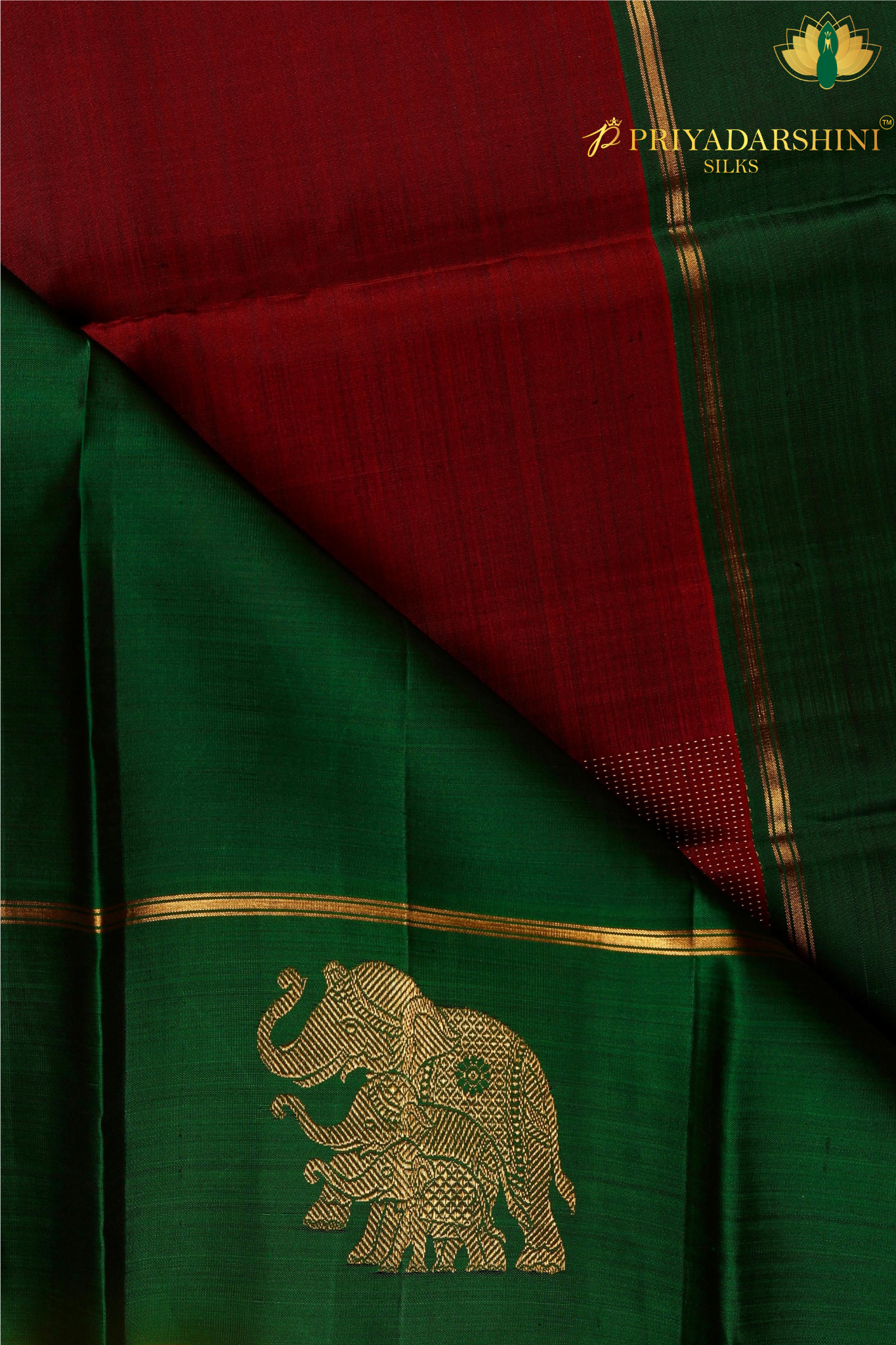 Kanchipuram Silk In Maroon With Elephant Zari Work Border