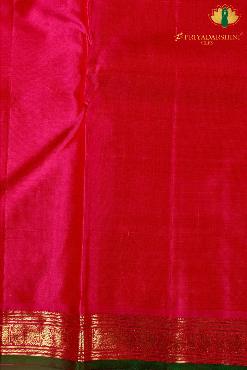 Small Border Green Kanchivaram Silk Saree with Mayil Chakram Selvedge | Priyadharshini Silks