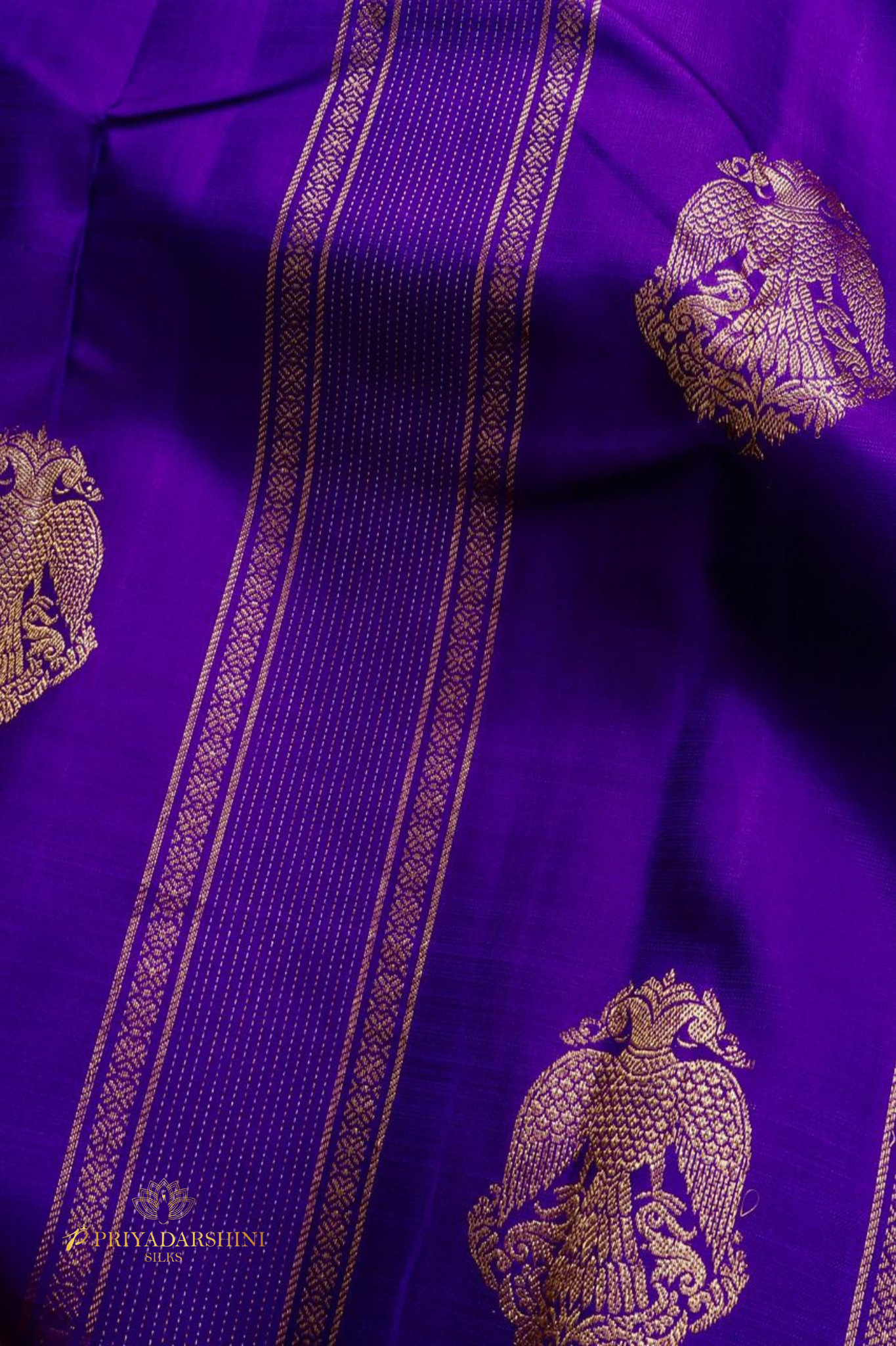 Borderless Purple Silk Saree with Iruthalai Pakshi Zari & Green Pallu | Priyadharshini Silks