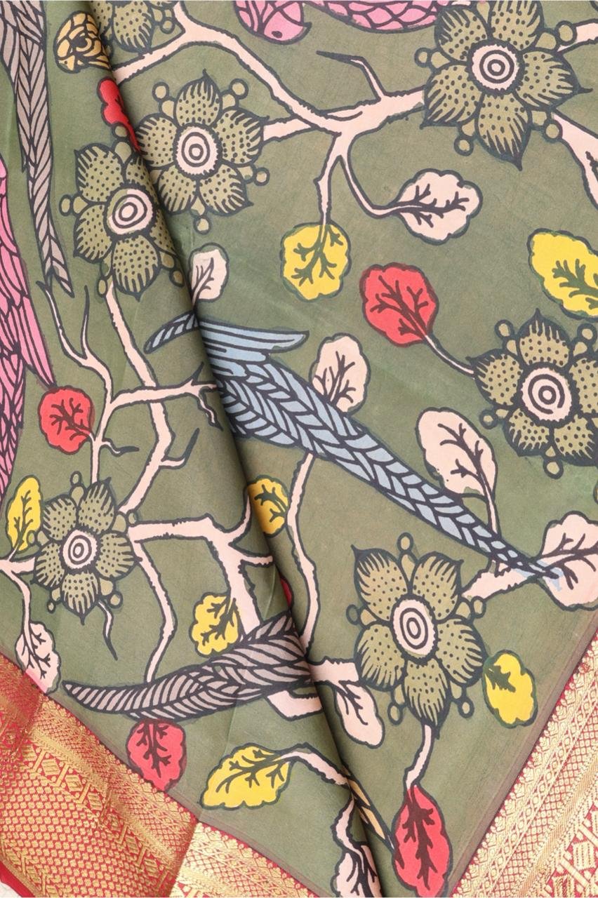 Vibrant leaf green base adorned with traditional hand painted Kalamkari motifs