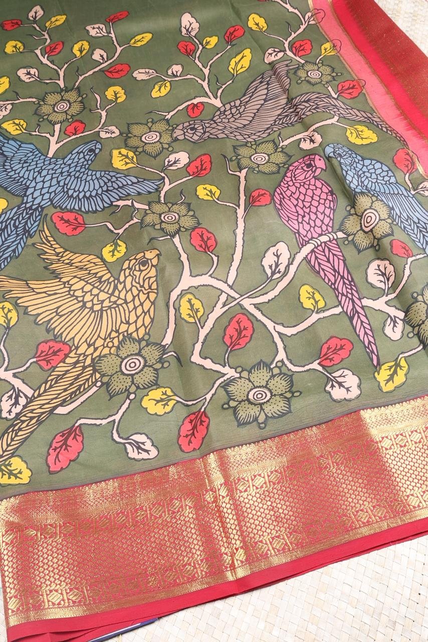 Vibrant leaf green base adorned with traditional hand painted Kalamkari motifs